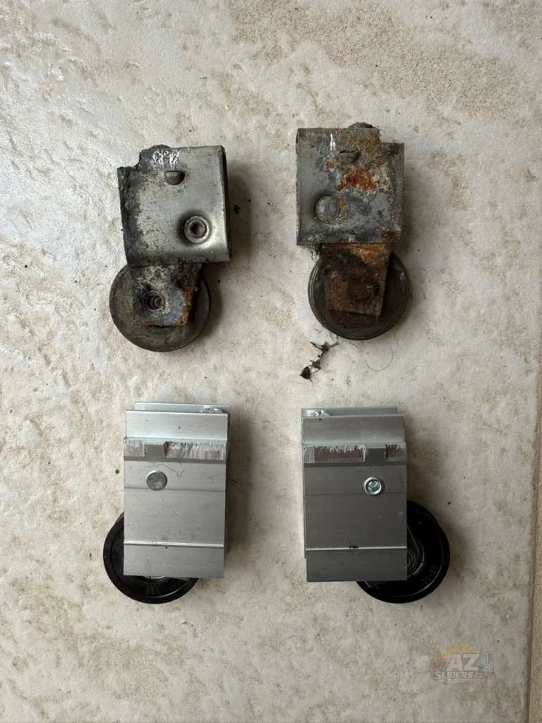 Old seized sliding door rollers next to new stainless steel replacement rollers — Scottsdale AZ repair by AZSliders